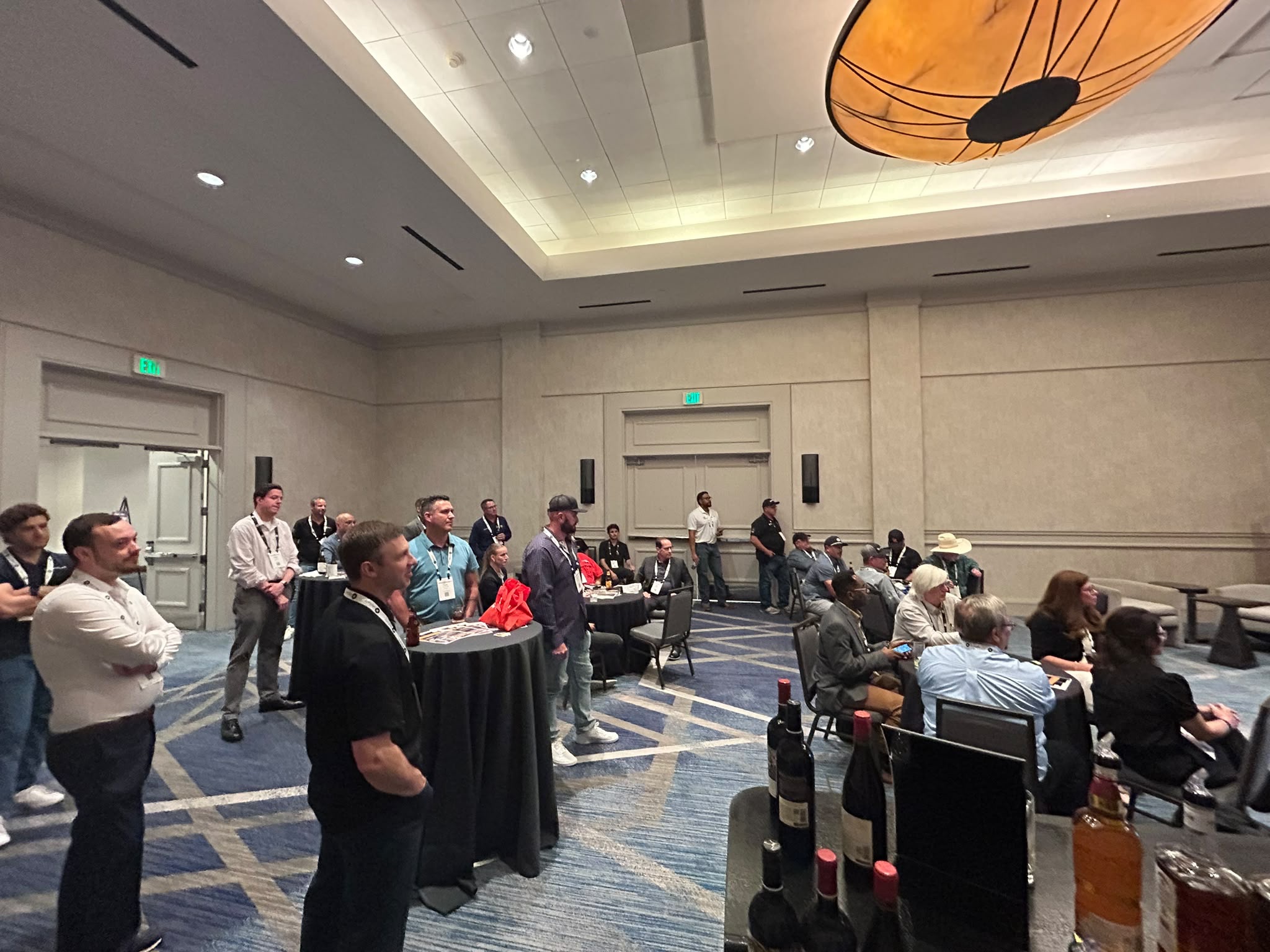 Guests at the Houston reception event hosted by MicroWatt Controls and ExRobotics